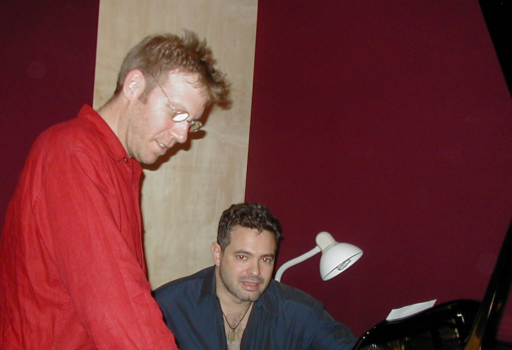 Yuval Ron in the studio at the piano with Bryan Pezzone
